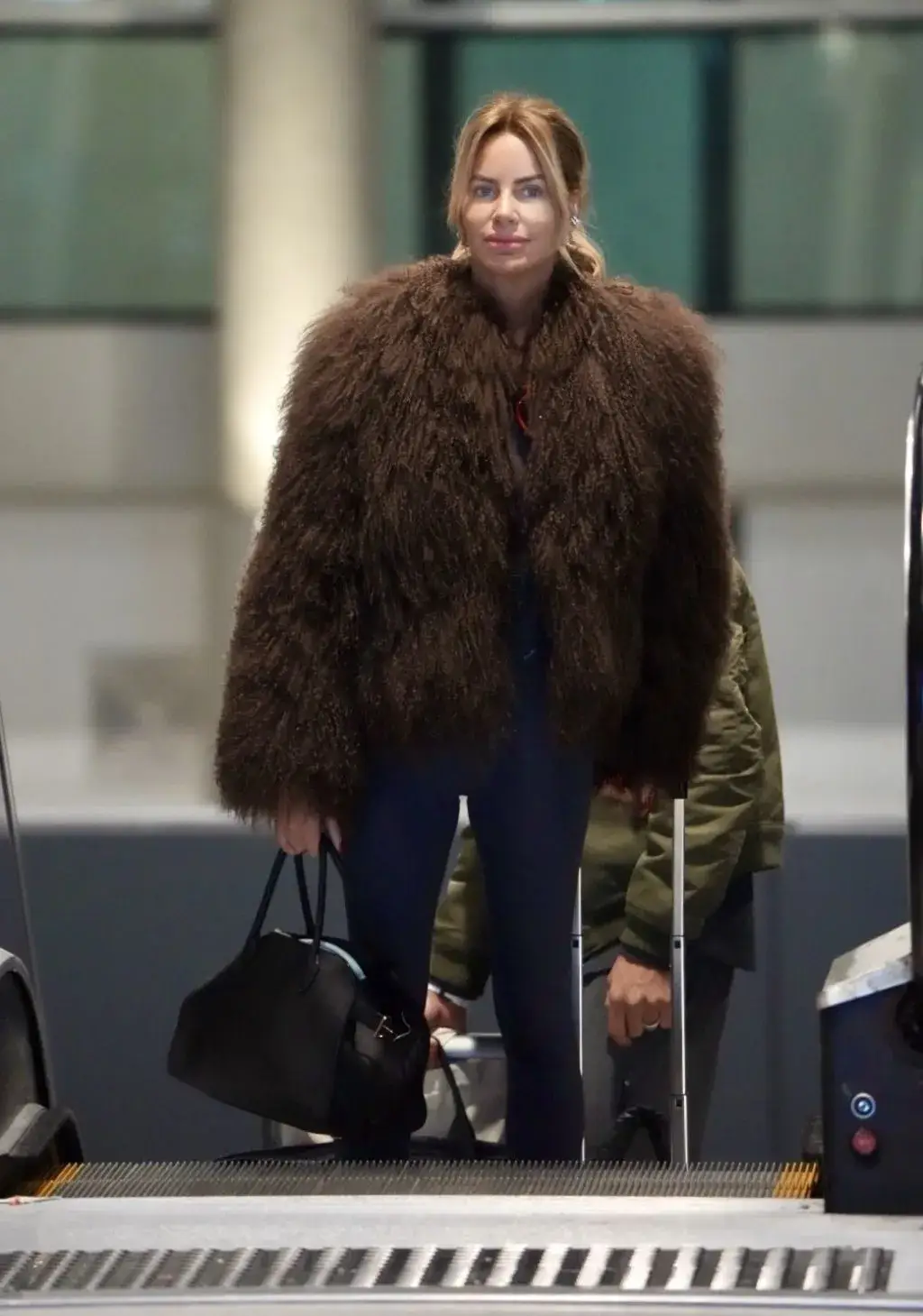 CAROLINE STANBURY PHOTOS AT BRISBANE AIRPORT